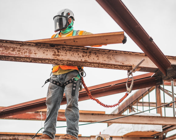 Person working on a steel beam